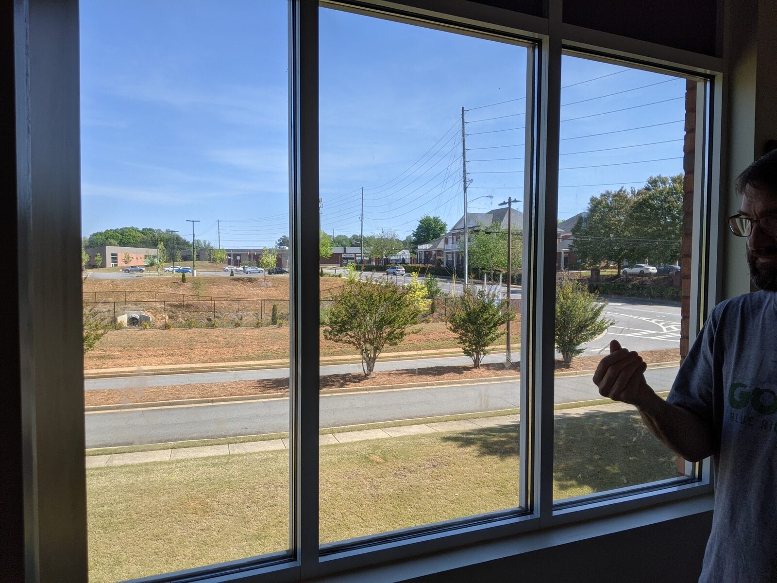 Tint Atlanta installer applying Madico film to exterior church glass